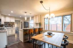 Parkway Place: Work, Relax, and Stay Long with Garage & Office Space